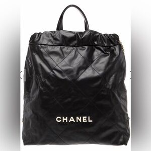 Chanel 22 Backpack black with gold hardware and RARE white enamel logo